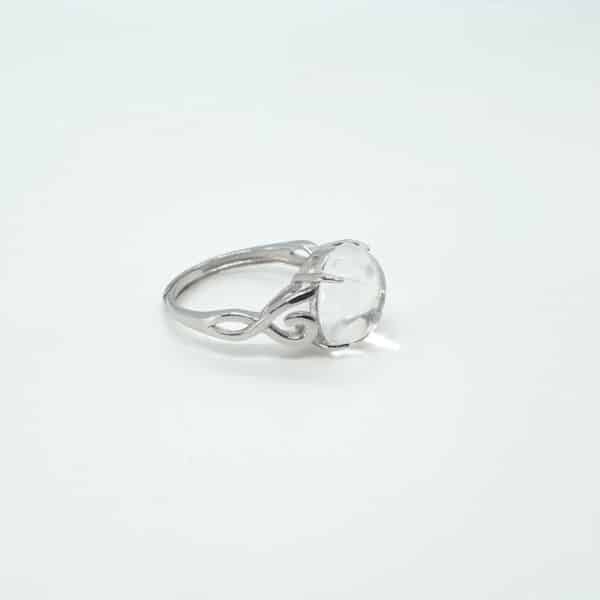 Bague en véritable cristal de roche et en argent 925 ajustable avec le symbole de l'infini